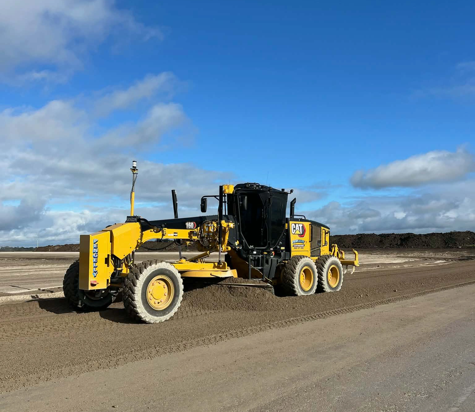 Pengelly Earthmoving Cat 160M AWD grader with Trimble machine control on a Melbourne infrastructure project